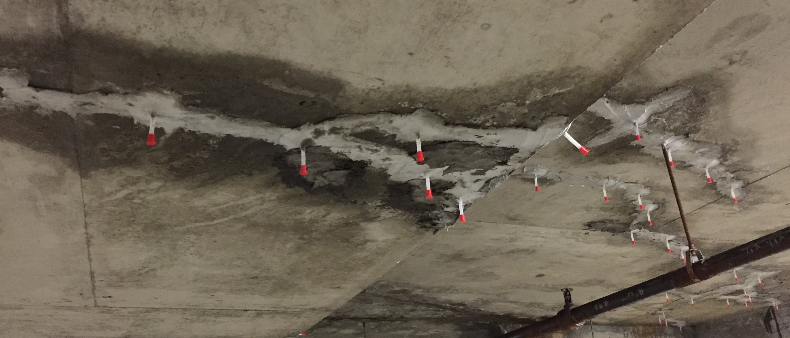 A concrete crack has been filled with an epoxy injection product..