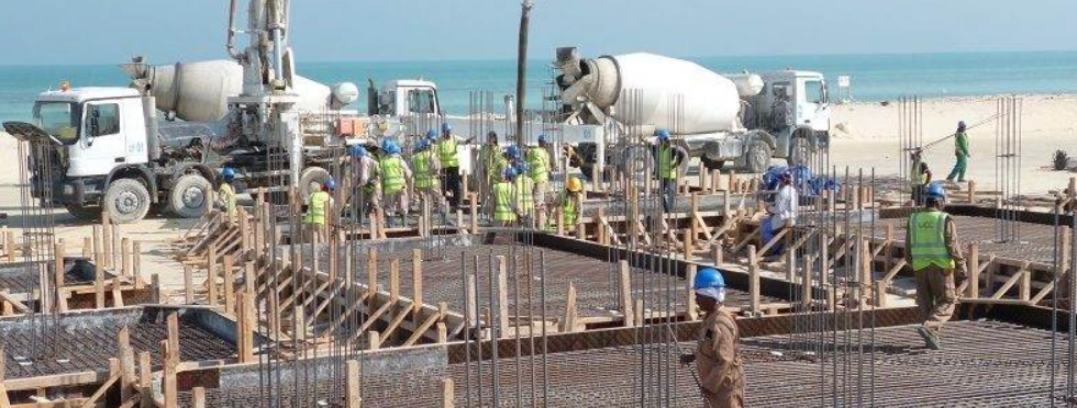 Construction workers are concreting in hot weather.