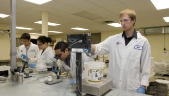 Scientists at Kryton's lab handle Smart Concrete products.