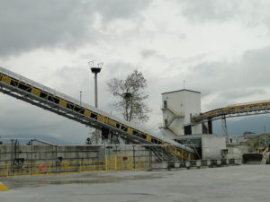 A batching plant is using less cement to reduce the concrete's carbon footprint.
