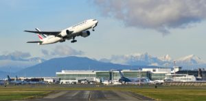An AirFrance airplane takes off from the YVR airport, which recently had one of its largest airport terminal expansions.